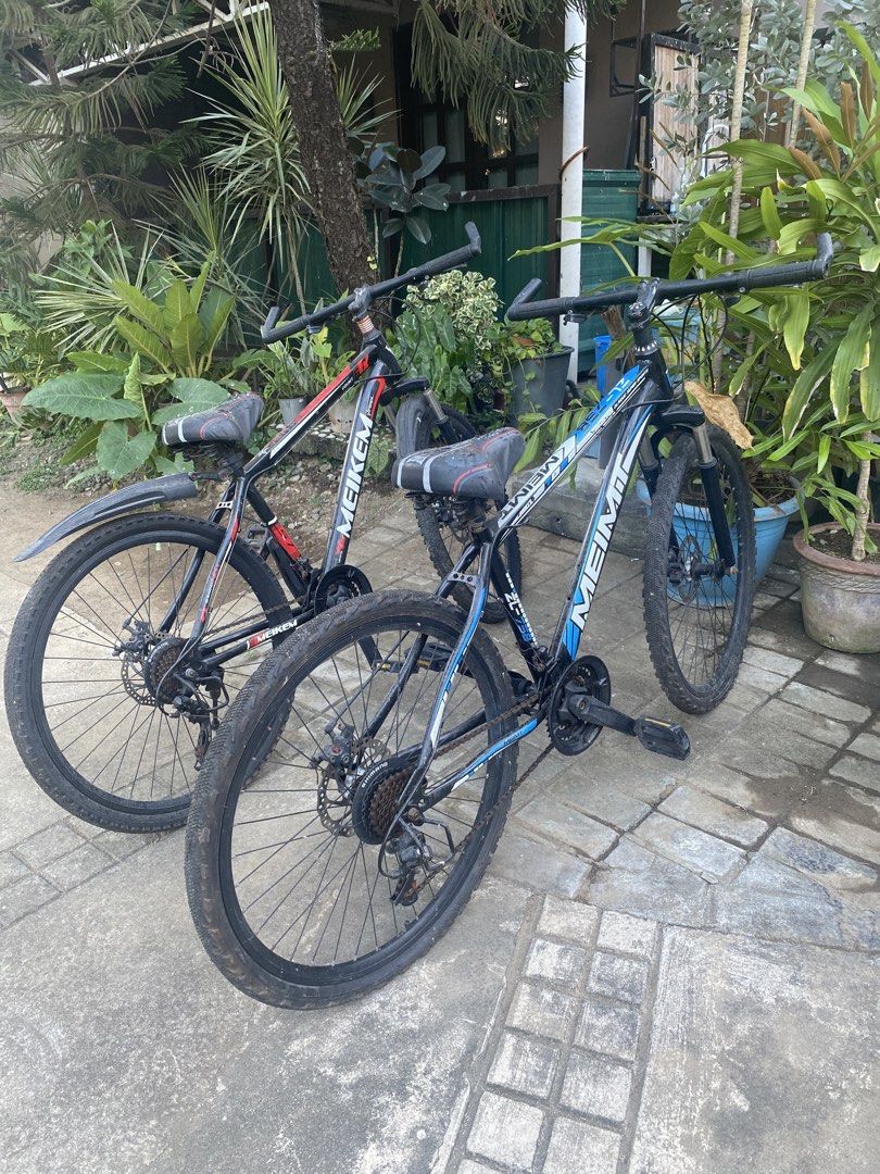 Take Both -Meikem Mountain Bike (Category: Bicycles) located in Paranaque City. Submitted by axie1206 (Listing ID 1471048465, Image 1). Description: - Brand/Model: Meikem Mountain Bike - Color: Black frame with stylish blue and white accents - Brakes & Suspension: Reliable disc brakes and smooth front suspension - Gears: Multi-speed gear system for versatile riding - Tires: Sturdy mountain tires, ideal for neighborhood cruising or trail practice 