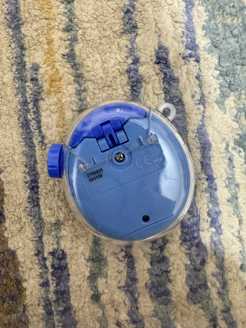 Tamagotchi Paradise Blue Water (Category: Interactive Toys) located in Manila. Submitted by blueberriri (Listing ID 1471019744, Image 2). Description: Rarely used. Bought Oct 3 No issues, with clear case and screen protector.