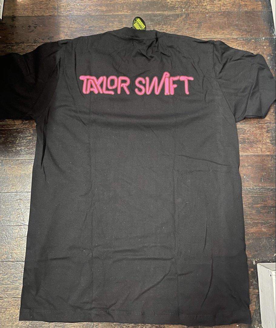 Taylor Swift black graphic shirt size large (Category: Shirts) located in Manila. Submitted by radvelarde (Listing ID 1470984638, Image 2). Description: .
