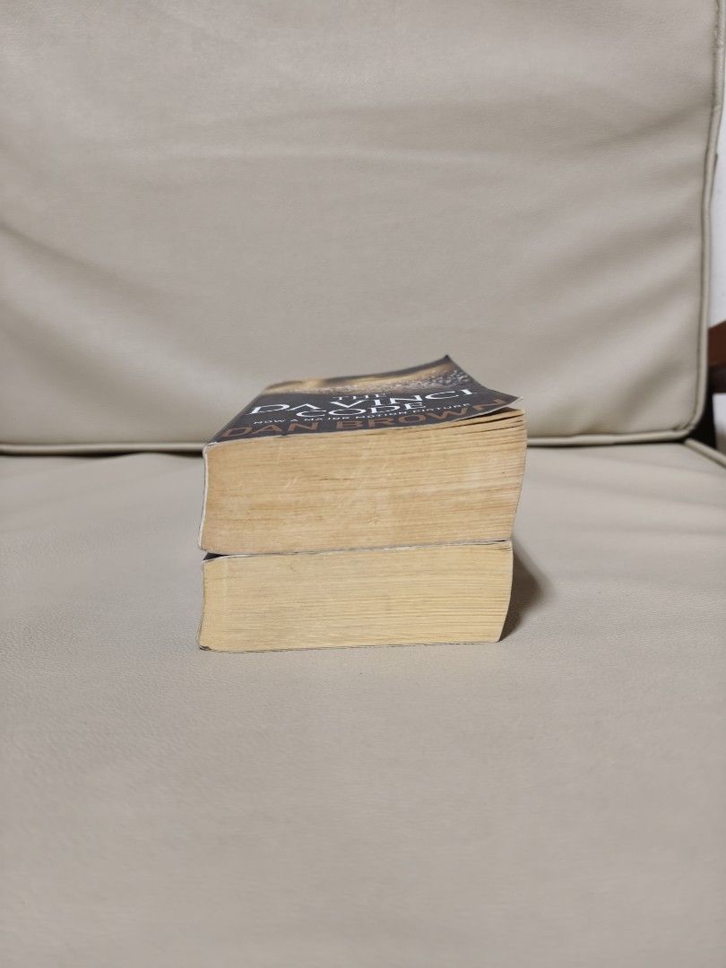 The Da Vinci Code & Angels and Demons by Dan Brown (Category: Storybooks) located in Antipolo. Submitted by chapchae (Listing ID 1471078334, Image 2). Description: - Set of 2 Dan Brown paperback thrillers: The Da Vinci Code and Angels & Demons - Pages have a vintage yellowed tint from age - Covers show minor shelf wear and edge curling - Great budget-friendly bundle for thriller fans - Set for 170.