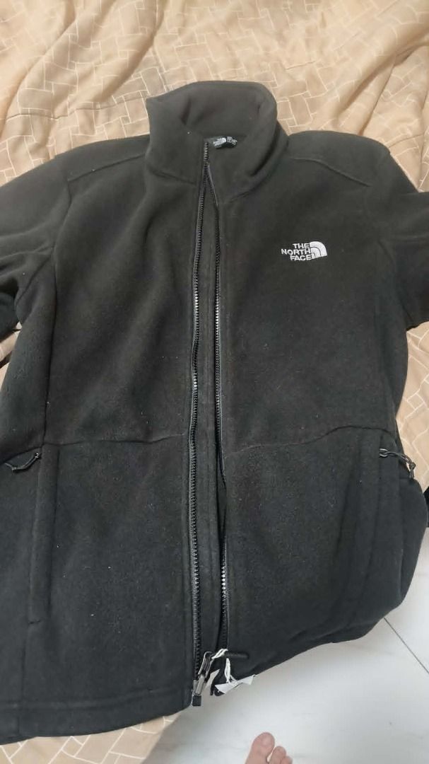 The North Face Black Fleece Jacket (Category: Coats, Jackets and Outerwear) located in Paranaque City. Submitted by cai_ars (Listing ID 1471110781, Image 1). Description: - From Japan - Brand: The North Face - Color: Classic Black - Closure: Full zip with wind-blocking high collar - Pockets: 2 secure zipped side pockets - Details: White embroidered logo on the chest - Fit & Feel: Standard fit, soft material, perfect for easy layering over tees or