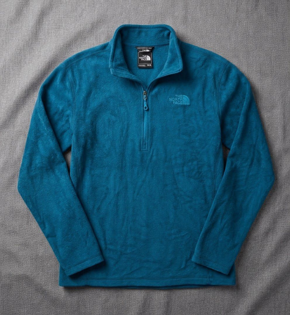 The North Face Men's Teal Blue Quarter Zip Fleece Pullover (Medium) (Category: Coats, Jackets and Outerwear) located in Tagaytay City. Submitted by barenwolf (Listing ID 1470966733, Image 3). Description: Authentic The North Face quarter-zip fleece pullover in a striking teal blue colorway Size: Men’s Medium (Made in Vietnam) Dimensions: W21.5” x L24” inches Crafted from soft, lightweight performance fleece that provides cozy insulation Features 