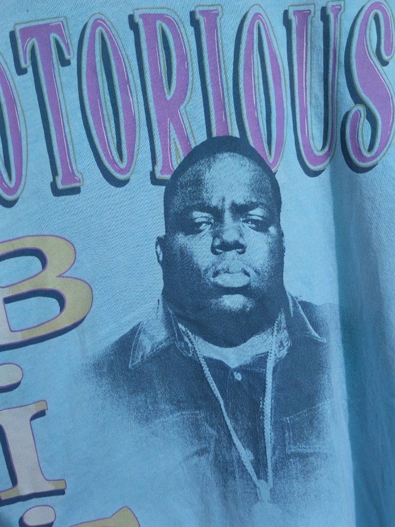 The Notorious B.I.G. (American Eagle) (Category: Tshirts & Polo Shirts ) located in Taguig. Submitted by thriftedminds (Listing ID 1470977116, Image 3). Description: Item: The Notorious B.I.G. (It was all a dream)🔥 ‎Size: OPT American Eagle (AE Band Tee) (XS/S) ‎Width: 21 ‎Length: 28.5 ‎Condition: Excellent ‎Issue: Tiny pinhole on neckline for hangtags DM to purchase 📩.