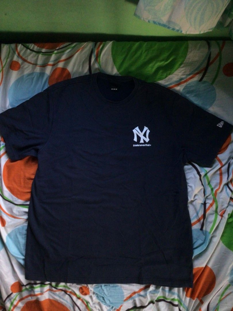 thisisneverthat x New Era Shirt (Category: Tshirts & Polo Shirts ) located in General Trias. Submitted by dunht (Listing ID 1471080712, Image 1). Description: - Brand/Collab: thisisneverthat x New Era - Design: New York Yankees Cooperstown logo on front, embroidered New Era flag on left sleeve - Color: Navy Blue - Size: 110 (XXL) - Fit: Regular fit crewneck - Material: Heavy cotton - Condition: Clean piece.