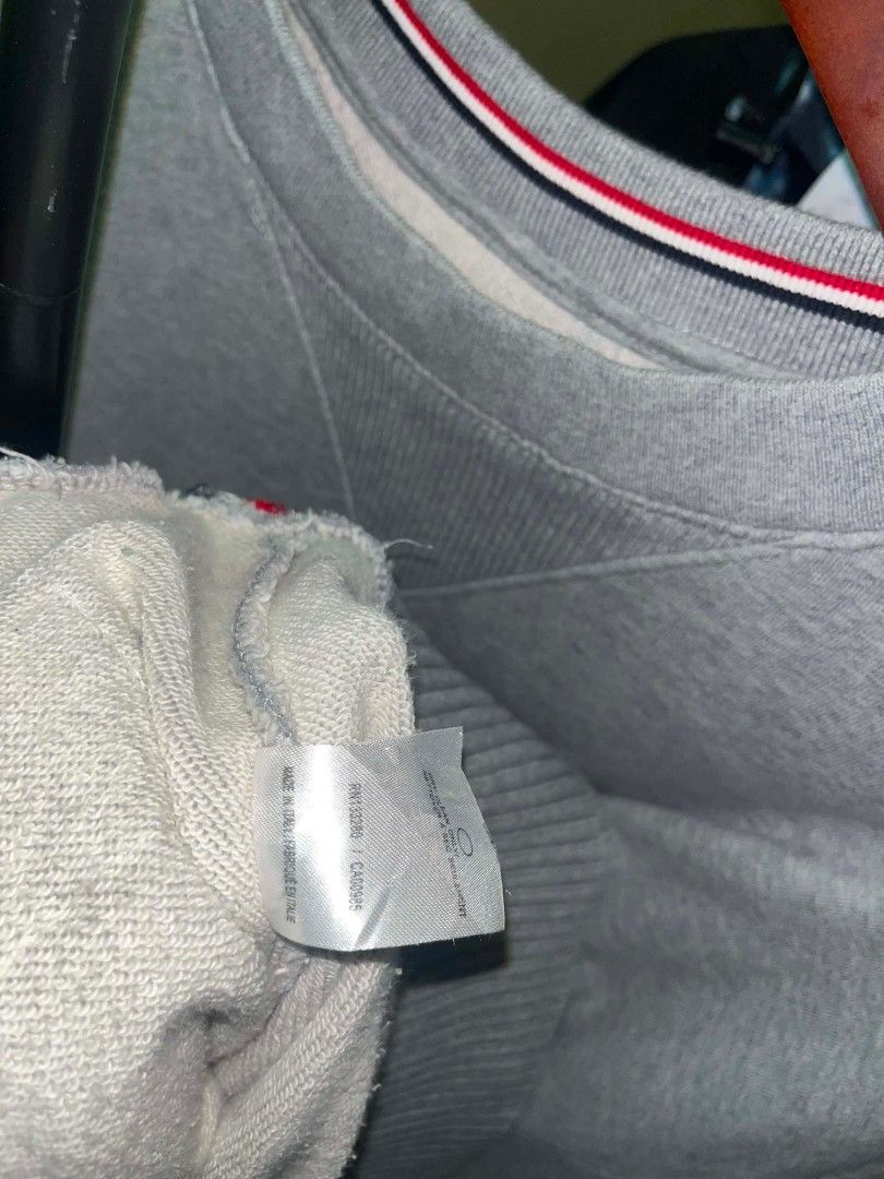 Thom Browne Grey 4-Bar Sweatshirt Size 2 (Category: Coats, Jackets and Outerwear) located in Tuguegarao City. Submitted by ZeevLim (Listing ID 1470936411, Image 2). Description: - Brand: Thom Browne - Item: Classic Crewneck Sweatshirt - Color: Grey - Size: 2 but xl - Material: Soft cotton loopback jersey (Made in Italy) - Key Features: Signature 4-white engineered stripes on left sleeve, ribbed V-inset with tricolor tipping, woven size label patc