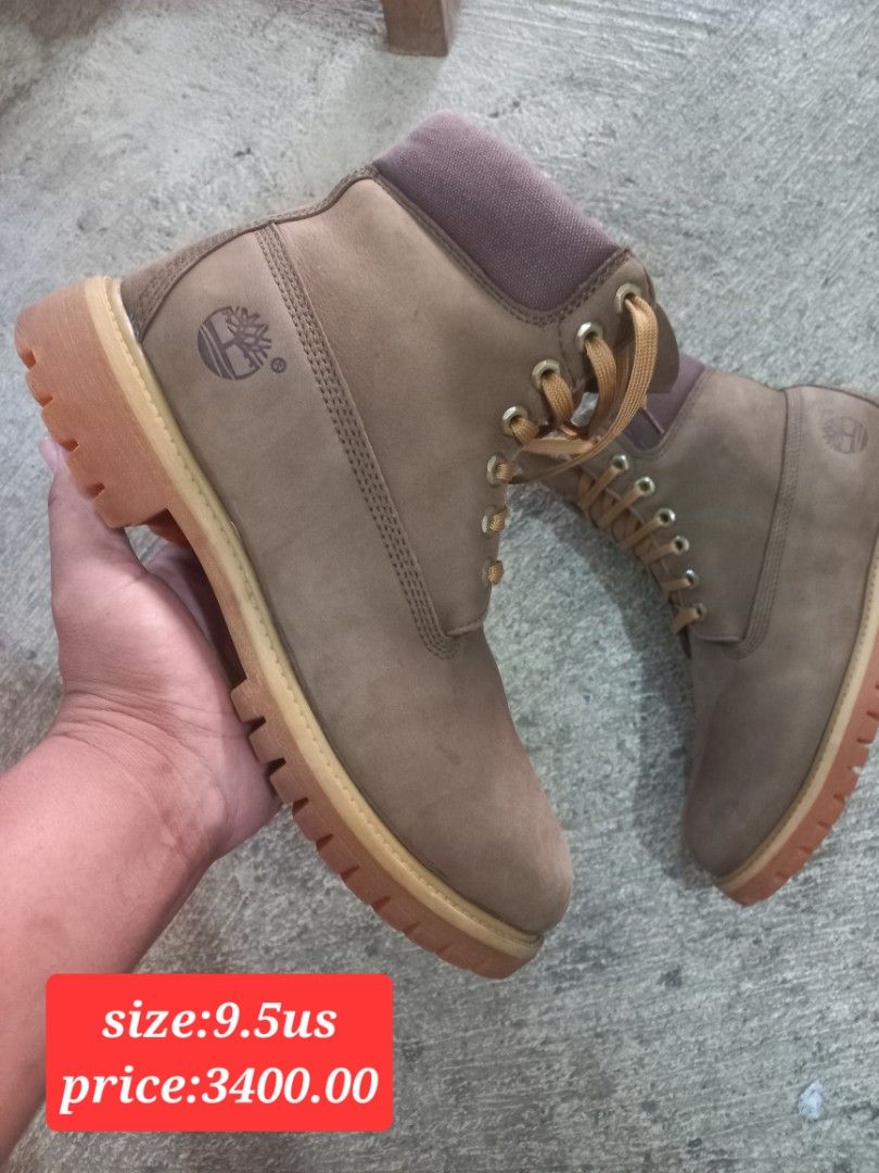 Timberland Boots Size 9.5US (Category: Boots) located in Kalibo. Submitted by jofit2ndhandshoes (Listing ID 1470946809, Image 1). Description: - Brand: Timberland - Material: Brown suede - Size: 9.5 US - Design: Classic lace-up with chunky rubber soles - Comfort: Padded collar around the ankle - Branding: Timberland tree logo stamped on the side - Condition: Normal signs of wear on the upper material.