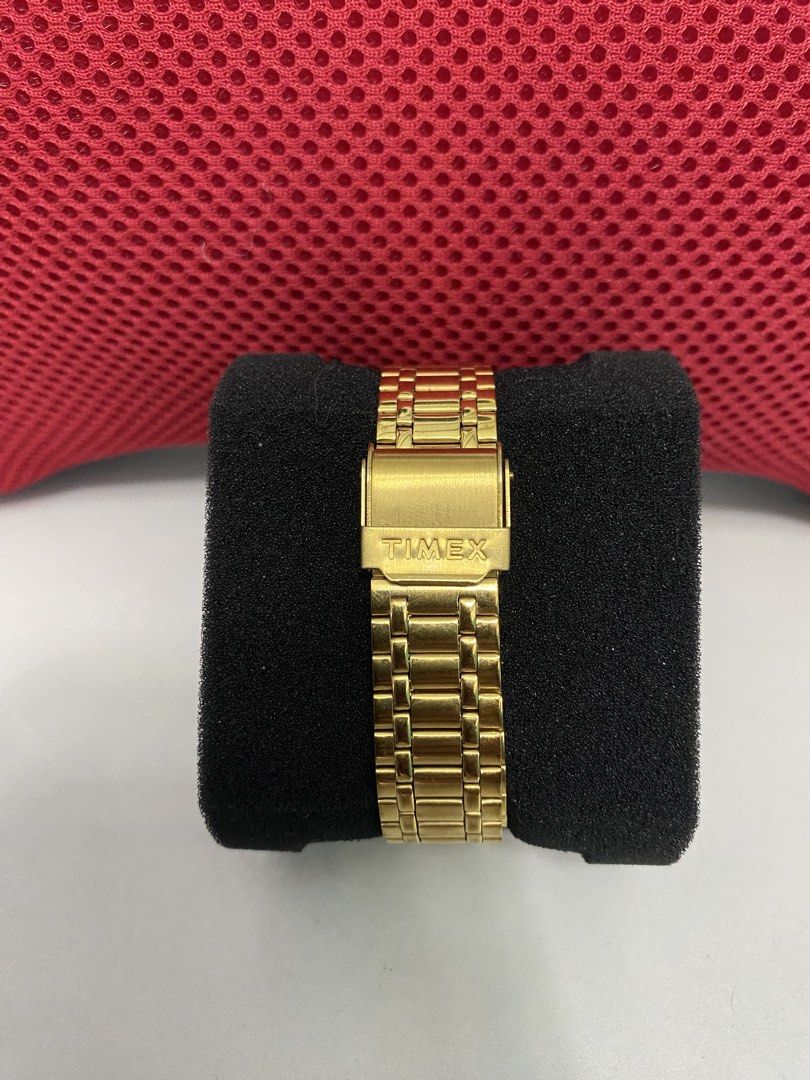 Timex Gold Tone Watch TW00A3043-AA (Category: Women's Watches) located in Baguio. Submitted by masterroller (Listing ID 1470970059, Image 2). Description: - Brand/Model: Timex Gold-Tone Watch (TW00A3043-AA) - Dial: Sunburst gold with clean stick markers - Strap: Matching gold-tone metal link bracelet with secure clasp - Specs: Stainless steel back, 30 meters water resistance - Movement: Battery-powered quartz movement, runs smoothly - Style: Clas