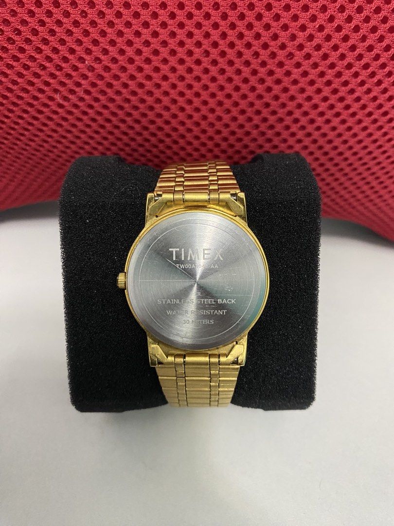 Timex Gold Tone Watch TW00A3043-AA (Category: Women's Watches) located in Baguio. Submitted by masterroller (Listing ID 1470970059, Image 3). Description: - Brand/Model: Timex Gold-Tone Watch (TW00A3043-AA) - Dial: Sunburst gold with clean stick markers - Strap: Matching gold-tone metal link bracelet with secure clasp - Specs: Stainless steel back, 30 meters water resistance - Movement: Battery-powered quartz movement, runs smoothly - Style: Clas