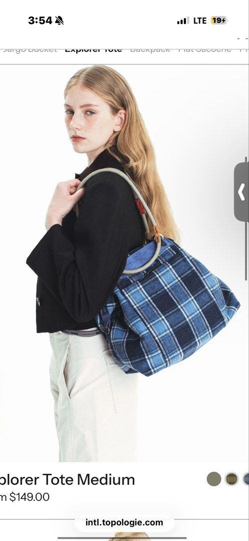 Topologie Explorer Tote Medium Blue Plaid (Category: Tote Bags) located in Manila. Submitted by amandada.doo (Listing ID 1471017949, Image 1). Description: - Brand/Model: Topologie Explorer Tote (Medium) - Color/Pattern: Blue plaid with vibrant orange tab detail - Straps: Signature rope shoulder strap - Design: Structured shape, ideal everyday carry-all bag - Condition: Clean interior and exterior, ready to use.