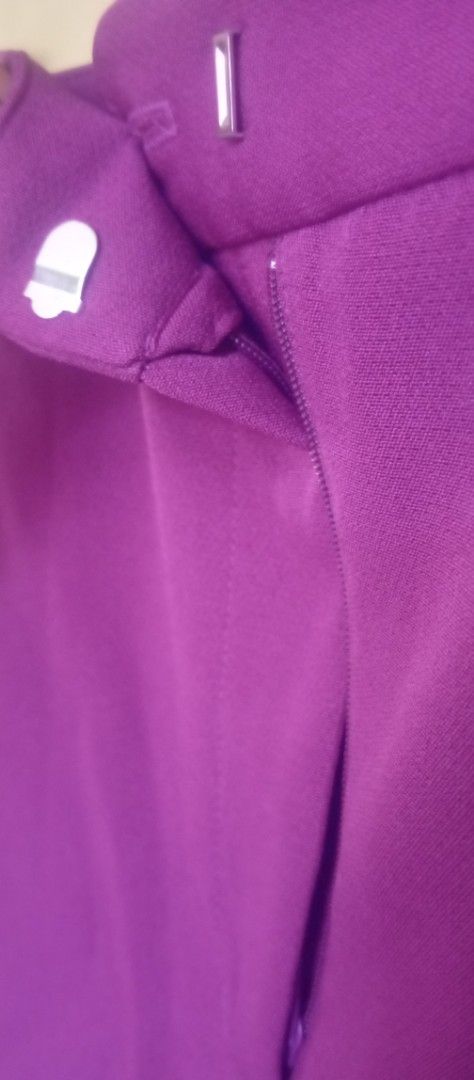 Topshop Purple Mini Skirt (Category: Skirts) located in Manila. Submitted by charlottej01596 (Listing ID 1470965174, Image 3). Description: - Brand: Topshop - Color: Vibrant purple - Style: Mini skirt with structured waistband and belt loops - Closure: Zip fly with hook-and-eye - Details: Fully lined interior with clean stitching - Origin: Made in Vietnam.