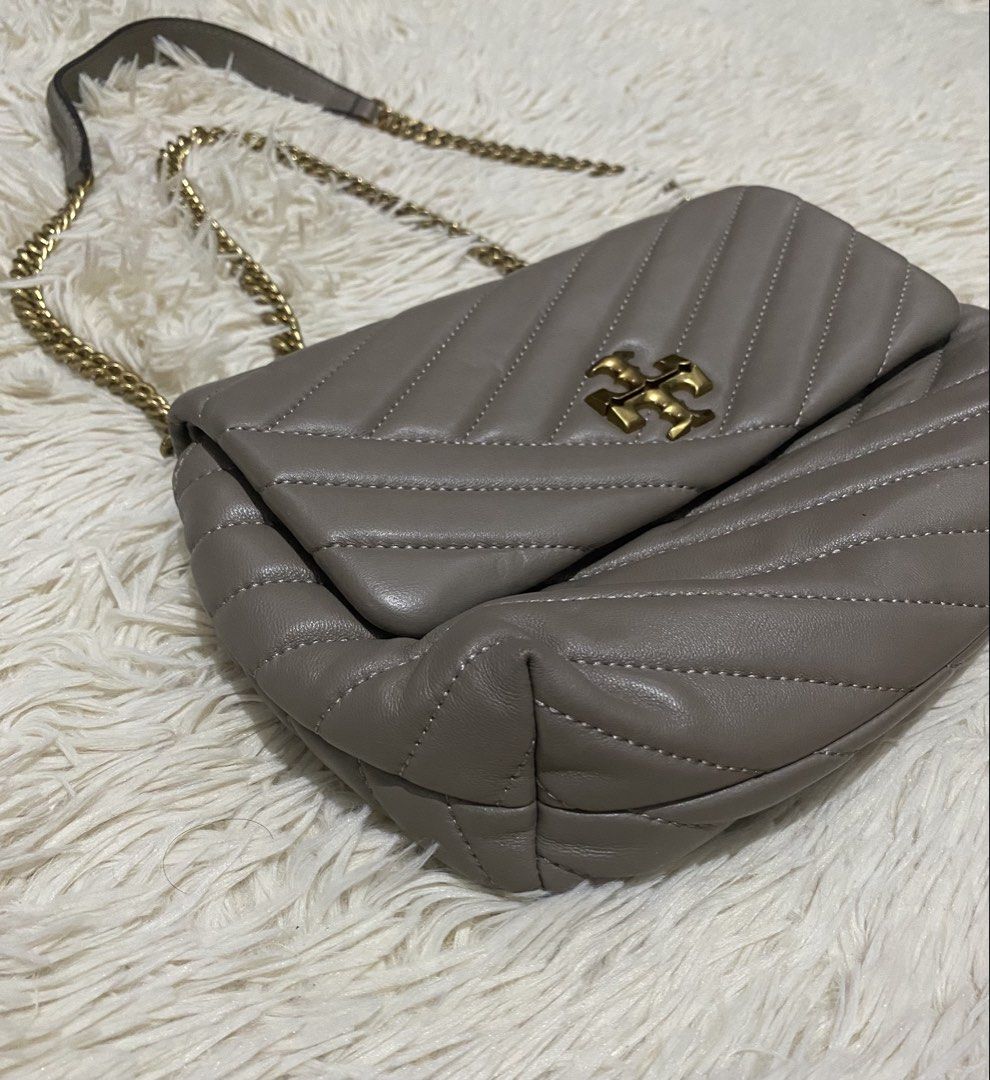 Tory Burch sheepskin Leather Bag (Category: Luxury Bags & Wallets) located in Manila. Submitted by switchcity (Listing ID 1471110652, Image 2). Description: - Brand: Tory Burch - Material: Premium gray quilted leather with chevron stitching - Hardware: Gold-tone double T logo and chain strap with leather shoulder guard - Closure: Secure front flap closure - Design: Soft structure with clean, elegant stitching - Size: Compact daily size, perfect f