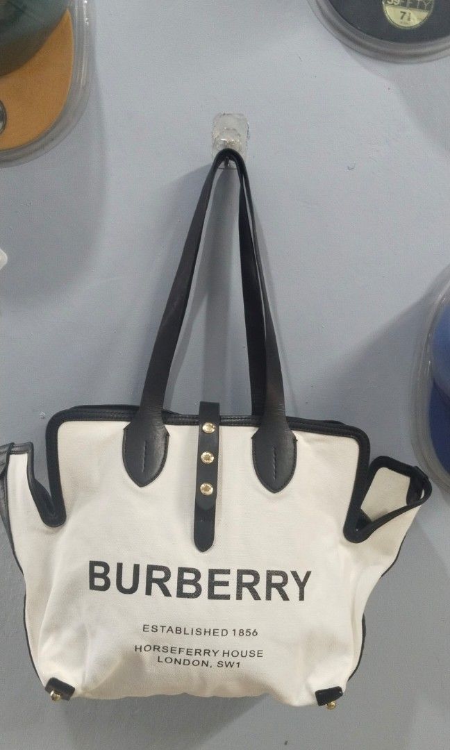 Tote bag (Category: Tote Bags) located in Trece Martires City. Submitted by vherma (Listing ID 1470966197, Image 2). Description: Burberry Medium Soft Canvas and Calfskin Belt Tote in natural and black (featuring the Horseferry address print)..