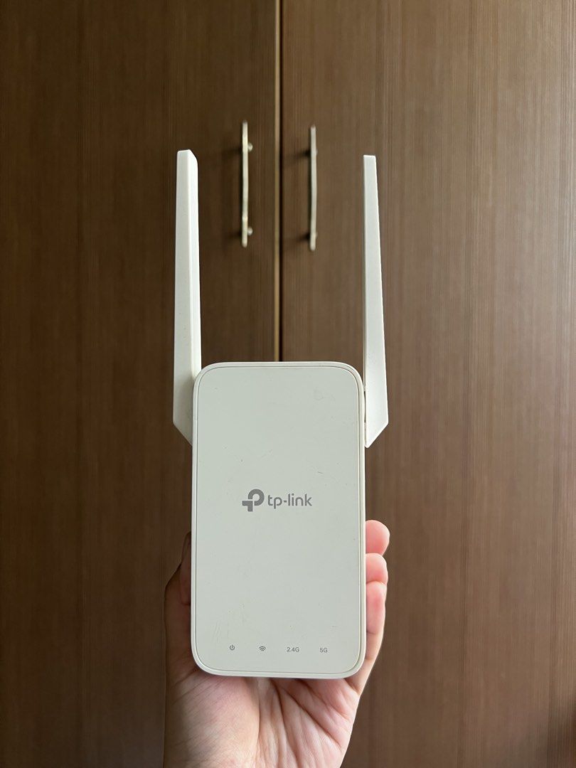 TP-Link RE215 AC750 Wi-Fi Range Extender (Category: Other Accessories) located in Manila. Submitted by honey.001 (Listing ID 1470954284, Image 1). Description: * Brand: TP-Link * Model: RE215 * Type: Wi-Fi Range Extender * Wi-Fi Standard: AC750 * Dual Band: 2.4GHz and 5GHz * Antennas: 2 external antennas * Power Input: 100–240V, 50/60Hz * Color: White * Condition: Pre-owned TP-Link RE215 AC750 Wi-Fi Range Extender. Dual band support for 2.4GHz an