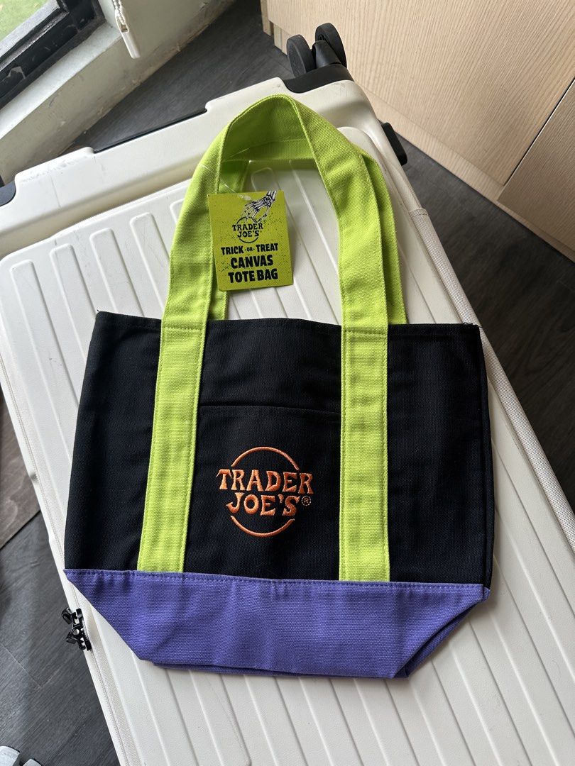 Trader Joe's canvas tote bag (Category: Tote Bags) located in San Pedro. Submitted by hallyuniverseshop (Listing ID 1471015699, Image 3). Description: Pastel blue #1 Black #1 Orange #1 (Brandnew, No tag).