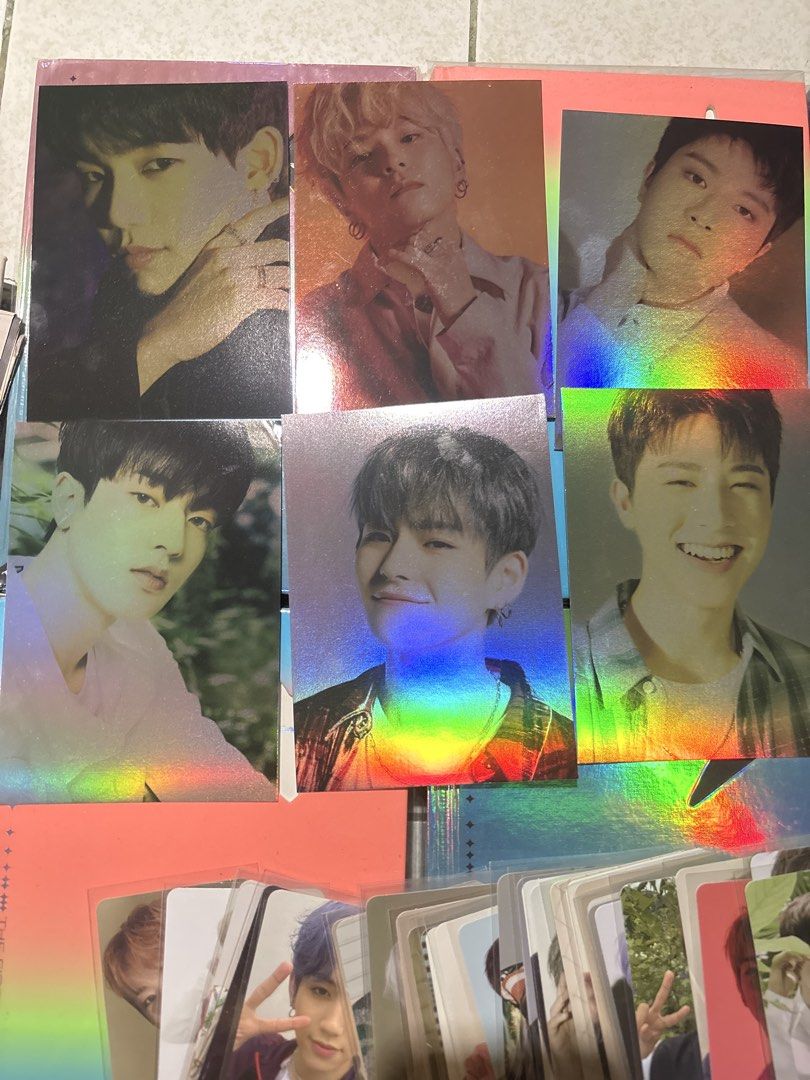 TREASURE The First Step Album Collection with Photocards (Category: CDs & DVDs) located in San Jose. Submitted by gee_06 (Listing ID 1471058718, Image 2). Description: Negotiable +Shipping fee - Full set of TREASURE 'The First Step' album series - Includes multiple versions with holographic covers & outer sleeves - Complete with photobooks and a large stack of member photocards - Pristine condition, kept securely in protective sleeves - Perfect a
