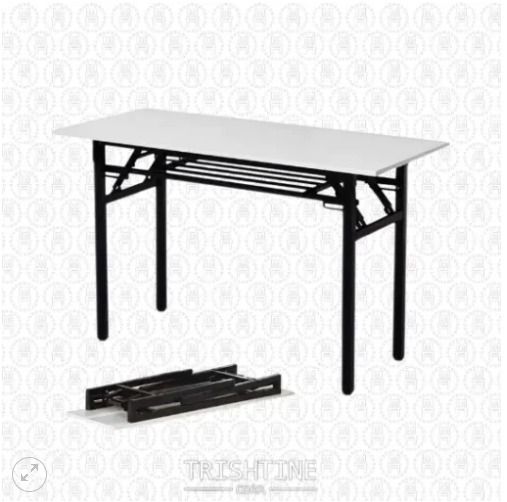 TRT-001 | Foldable Training Table (Category: Tables & Sets) located in Caloocan City. Submitted by jim.trishtineofficefurnitures (Listing ID 1470982351, Image 1). Description: - Color & Design: Clean, minimalist white top with sturdy black metal legs - Built-in Lower Shelf: Provides extra storage for books, laptops, or essentials - Space-Saving: Ideal for small rooms, study areas, or temporary workspaces - Easy Storage: Folds completely flat for 