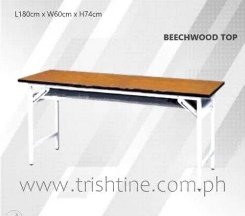 TRT-009 | Foldable Training Table (Category: Tables & Sets) located in Caloocan City. Submitted by jim.trishtineofficefurnitures (Listing ID 1470984540, Image 1). Description: - Dimensions: 180cm (L) x 60cm (W) x 74cm (H) - Stylish beechwood finish top with a sturdy white metal frame - Foldable legs for quick setup, easy transport, and compact storage - Versatile use: ideal for events, office work, study sessions, or extra dining space - Conditio