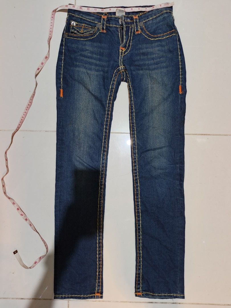 True Religion Billy Super T Jeans Size 27 (Category: Jeans) located in Davao. Submitted by romelyap (Listing ID 1471005059, Image 2). Description: - Brand/Model: True Religion Billy Super T Jeans - Wash: Dark blue wash - Size: Waist 27 - Details: Signature thick orange & white contrast stitching, button-flap back pockets - Fit: Straight legs, classic denim styling - Origin: Made in USA.