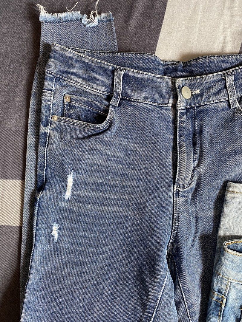 Blue Denim Jeans Bundle (2 pairs) (Category: Jeans) located in Manila. Submitted by heyheyruok (Listing ID 1470954318, Image 2). Description: - Bundle includes 2 pairs of blue denim jeans - Pair 1: Trendy distressed front details with a frayed raw hem - Pair 2: JAG jeans with classic contrast stitching and rear brand patch - Fit: Mid-rise with belt loops and button closures - Features: Classic front and back pockets - Condition: Great everyday we