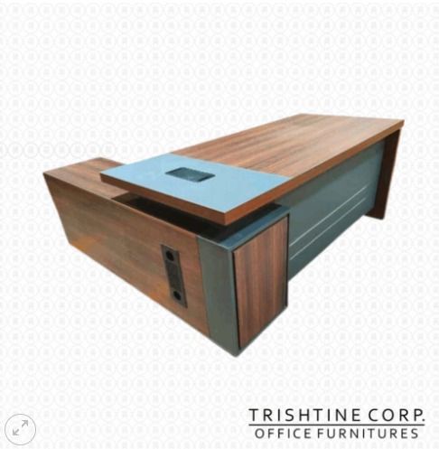 TXT-032 | Executive Table w/ Combination Lock Drawer (Category: Office Furniture & Fixtures) located in Caloocan City. Submitted by jim.trishtineofficefurnitures (Listing ID 1471012677, Image 1). Description: - Modern L-shaped executive desk in wood finish with grey accents - Built-in cable management ports on the surface and side module - Side return unit equipped with integrated power outlets and media ports - Sturdy wooden construction designe