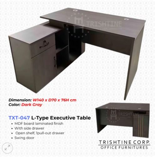 TXT-047 | L-Type Executive Table (Category: Office Furniture & Fixtures) located in Caloocan City. Submitted by jim.trishtineofficefurnitures (Listing ID 1471015460, Image 1). Description: - Product: Trishtine TXT-047 L-type Executive Table - Color: Dark Gray - Dimensions: W140 x D70 x H76 cm - Material: Sturdy MDF board with a sleek laminated finish - Storage features: Side drawer, pull-out drawer, open shelf, and swing door - Ideal for: Modern 
