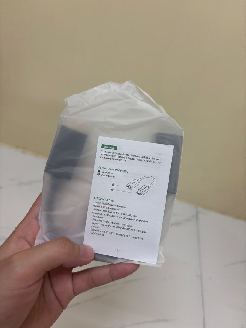 UGREEN 4K DisplayPort to HDMI Adapter (Category: Cables & Adaptors) located in Manila. Submitted by vegajhasse57128 (Listing ID 1471038639, Image 3). Description: - Brand: UGREEN (Model 40363) - Resolution: Up to 4K at 30Hz - Audio: Uncompressed LPCM audio supported - Specs: 300MHz bandwidth, 25cm total length - Ports: DisplayPort (Male) to HDMI (Female) - Condition: Brand new in original packaging with manual.