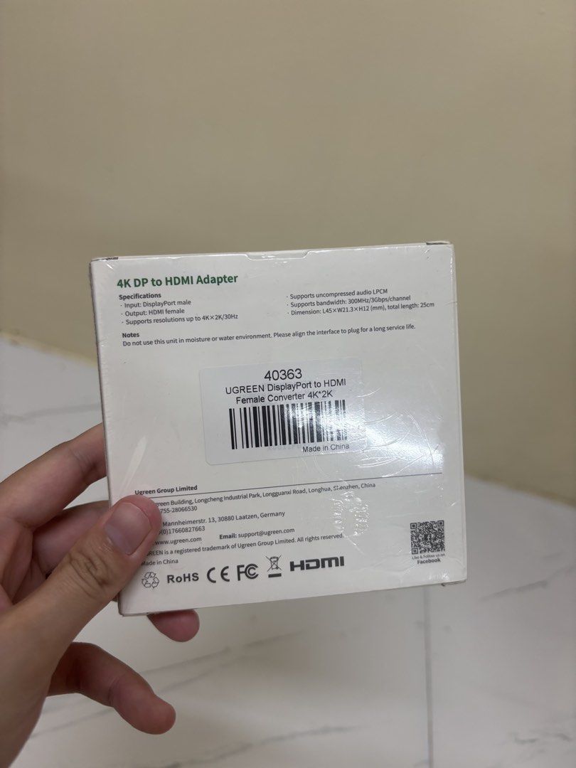 UGREEN 4K DisplayPort to HDMI Adapter (Category: Cables & Adaptors) located in Manila. Submitted by vegajhasse57128 (Listing ID 1471038639, Image 2). Description: - Brand: UGREEN (Model 40363) - Resolution: Up to 4K at 30Hz - Audio: Uncompressed LPCM audio supported - Specs: 300MHz bandwidth, 25cm total length - Ports: DisplayPort (Male) to HDMI (Female) - Condition: Brand new in original packaging with manual.