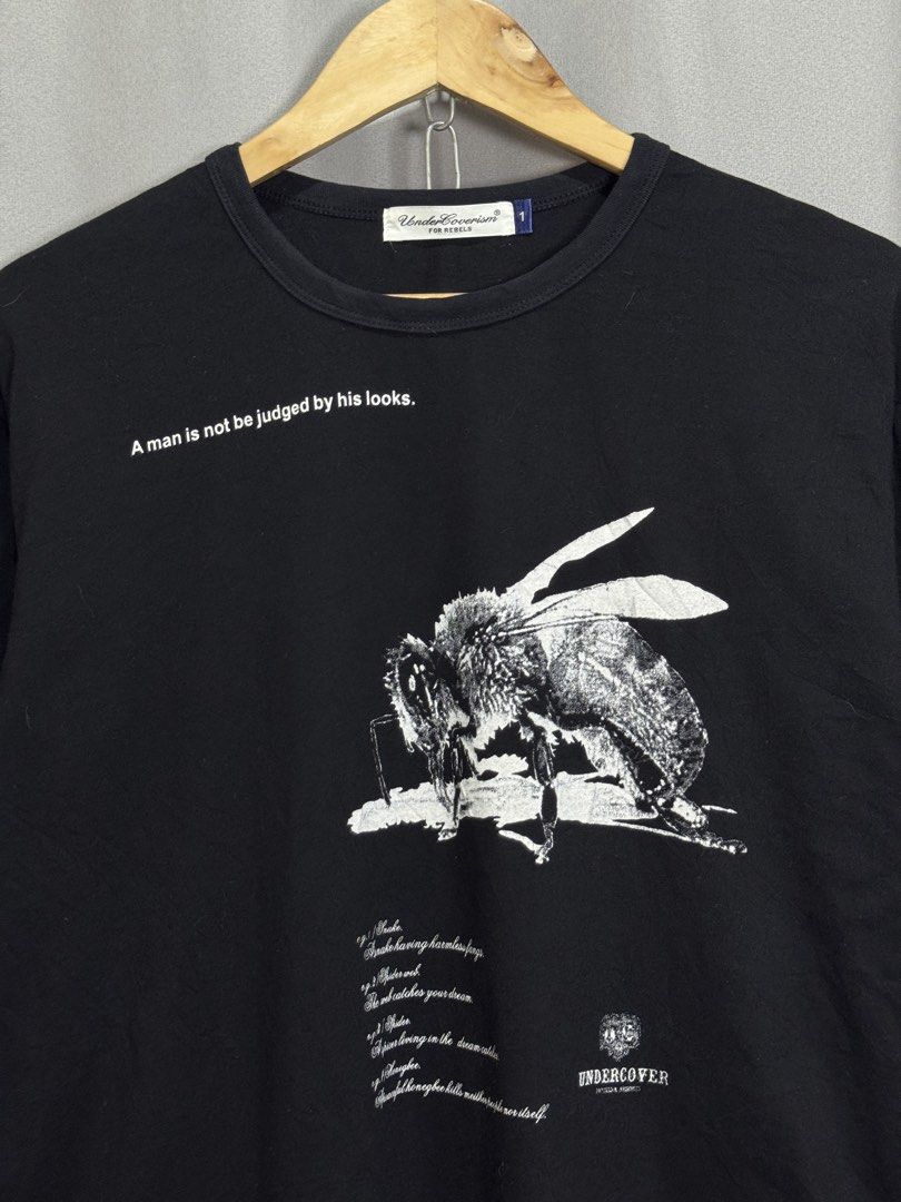 Undercoverism Graphic Tee (Category: Tshirts & Polo Shirts ) located in Meycauayan. Submitted by itstimothrifts (Listing ID 1471008969, Image 2). Description: Undercoverism Graphic Tee Excellent Condition No fllaws Size 1 on tag Medium W 21.5 L 26.5.