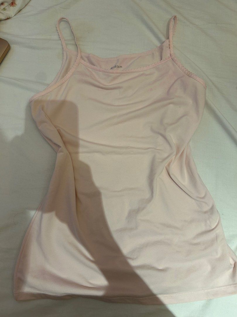 Uniqlo arism tank top (Category: Sleeveless) located in Manila. Submitted by coquettecosette (Listing ID 1470959338, Image 1). Description: Pink uniqlo arism tank top super comfortable💗.