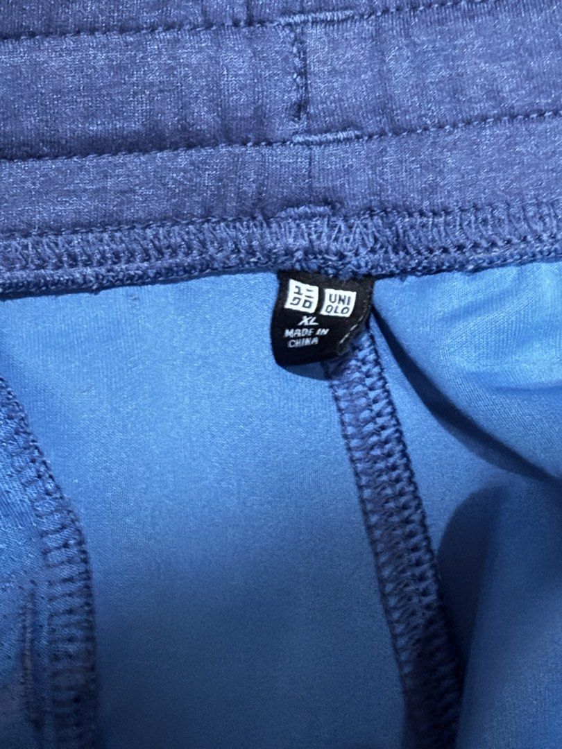 Uniqlo Blue Sweatpants XL (Category: Joggers) located in Del Monte. Submitted by matthew_0331 (Listing ID 1471052278, Image 3). Description: - Brand: Uniqlo - Color: Blue - Size: XL - Fit & Comfort: Drawstring waist, ribbed ankle cuffs, and soft fabric - Features: Convenient pockets on both sides - Versatility: Perfect for casual everyday loungewear or workout gear - Origin: Made in China.