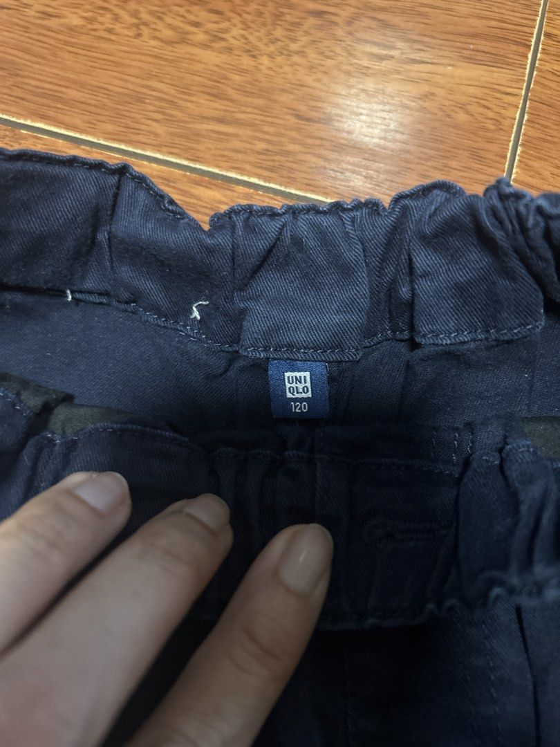 Uniqlo Boys Shorts (Category: Babies & Kids Fashion) located in Quezon City. Submitted by toothfairy0323 (Listing ID 1470973044, Image 2). Description: Navy blue shorts for boys. Elastic waistband with a front button closure. Two front pockets included. Simple everyday shorts, easy to match with t-shirts or polo shirts. Cotton fabric, comfortable for daily wear..