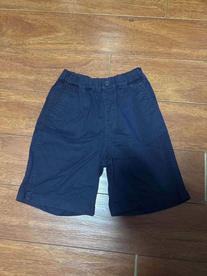 Uniqlo Boys Shorts (Category: Babies & Kids Fashion) located in Quezon City. Submitted by toothfairy0323 (Listing ID 1470973044, Image 1). Description: Navy blue shorts for boys. Elastic waistband with a front button closure. Two front pockets included. Simple everyday shorts, easy to match with t-shirts or polo shirts. Cotton fabric, comfortable for daily wear..