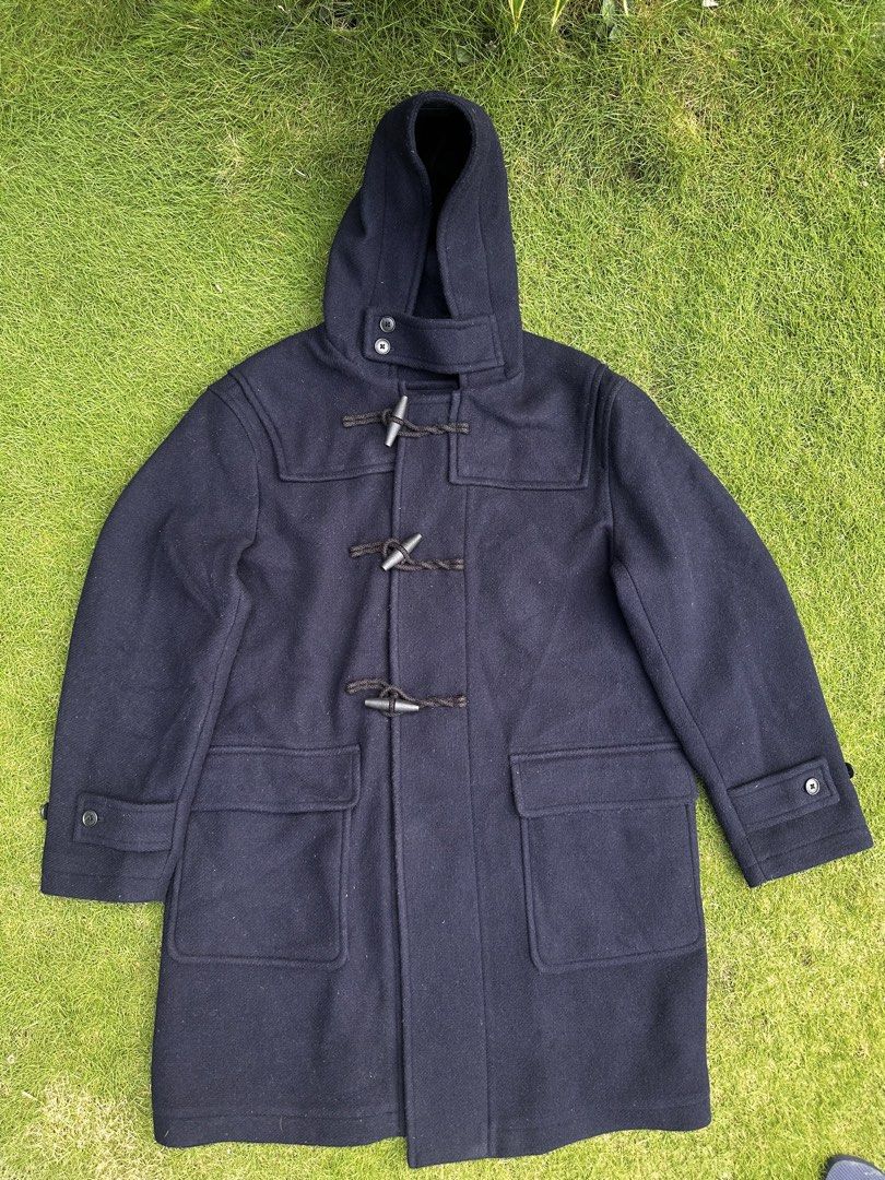 UNIQLO DUFFLE COAT NAVY (Category: Coats, Jackets and Outerwear) located in Tacurong. Submitted by locationtacurongcitymindanao (Listing ID 1471049078, Image 2). Description: 67% polyester 33%wool Length-38 Width- 26 Sleeves-25 .