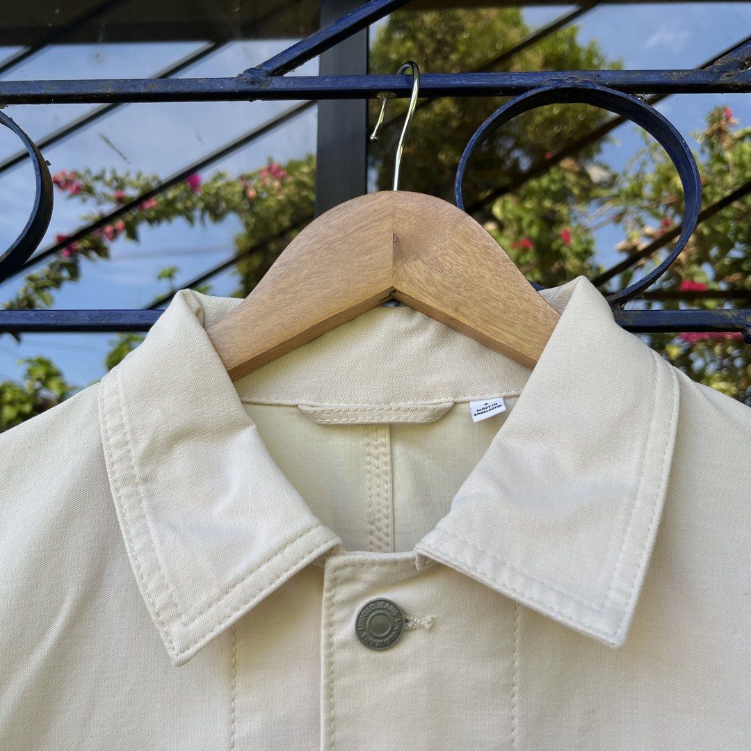 Uniqlo Off-White Utility Chore Jacket Size S (Category: Coats, Jackets and Outerwear) located in Davao. Submitted by streetsight (Listing ID 1471020655, Image 2). Description: - Brand: Uniqlo - Style: Chore Jacket - Color: Off-White - Size: S - Material: Polyester and cotton blend - Origin: Made in Bangladesh - Features: Classic collar, front button placket, and multiple functional utility pockets with button closure.