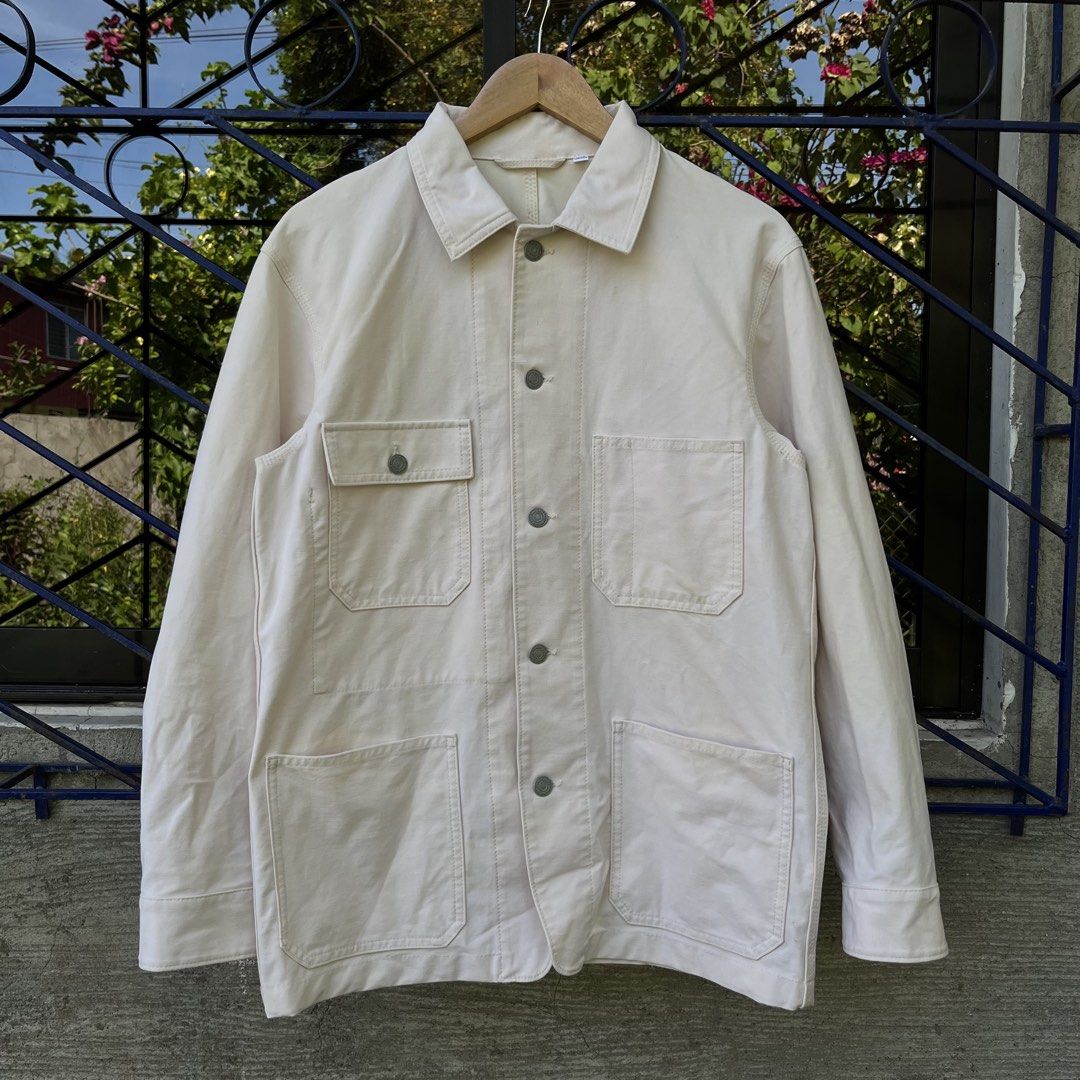 Uniqlo Off-White Utility Chore Jacket Size S (Category: Coats, Jackets and Outerwear) located in Davao. Submitted by streetsight (Listing ID 1471020655, Image 1). Description: - Brand: Uniqlo - Style: Chore Jacket - Color: Off-White - Size: S - Material: Polyester and cotton blend - Origin: Made in Bangladesh - Features: Classic collar, front button placket, and multiple functional utility pockets with button closure.
