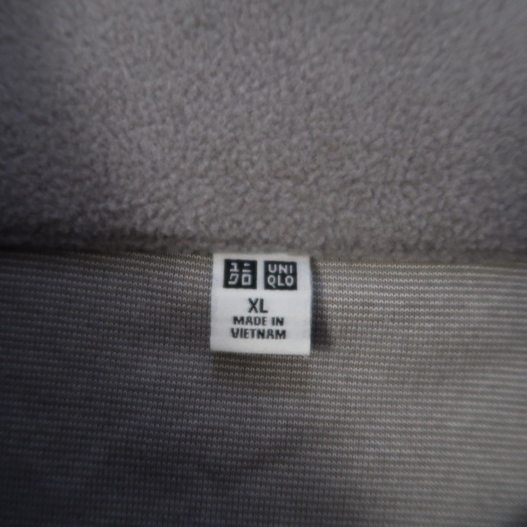 Uniqlo Quarter-Zip Fleece Pullover Grey XL (Category: Coats, Jackets and Outerwear) located in Manila. Submitted by mixi_lexi (Listing ID 1471043333, Image 2). Description: - Brand: Uniqlo - Item: Quarter-zip fleece pullover - Color: Grey - Size: XL - Origin: Made in Vietnam - Features: Soft fleece material, stand-up collar, half zipper closure - Condition: Clean, great layering piece for cold weather.
