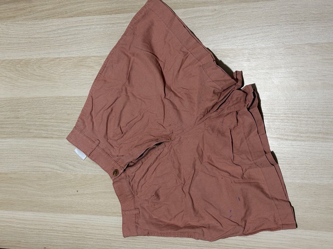 Uniqlo Shorts Bundle (4 Colors) (Category: Shorts) located in Mandaluyong City. Submitted by supercleng (Listing ID 1471076642, Image 3). Description: - Bundle includes 4 pairs of casual shorts - Colors: Pink, blue, olive green, and dark navy - Closure: Button with front zipper - Pink shorts has paint stains - Sold as a set only.