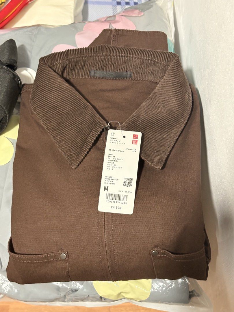 Uniqlo Zip Up Short Jacket Dark Brown Size M (Category: Coats, Jackets and Outerwear) located in Binan City. Submitted by heyyabi (Listing ID 1470980512, Image 2). Description: - Brand new with original tags attached NEVER USED - Brand: Uniqlo - Color: Dark brown - Size: M bought in japan for ¥4990 / ₱1990 RFS: size too small for my liking.