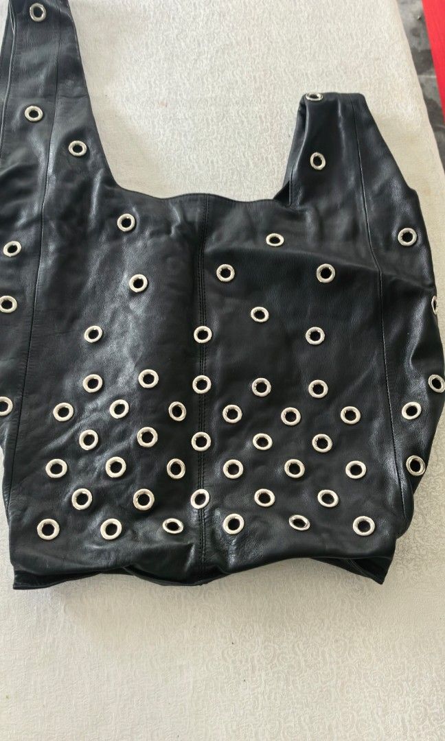 Unique vintage leather with round stud big bag (Category: Tote Bags) located in Tuguegarao City. Submitted by zenphoenix-7ad615 (Listing ID 1470967772, Image 1). Description: Genuine leather Pretty in actual Coachella outfit 18 inches by 15 inches.