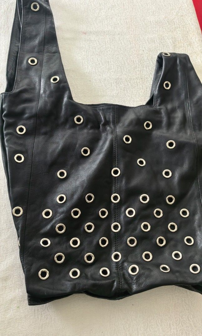 Unique vintage leather with round stud big bag (Category: Tote Bags) located in Tuguegarao City. Submitted by zenphoenix-7ad615 (Listing ID 1470967772, Image 2). Description: Genuine leather Pretty in actual Coachella outfit 18 inches by 15 inches.