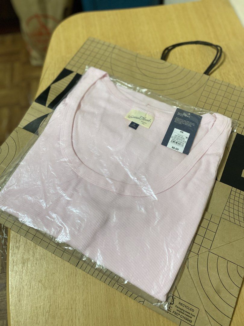 Universal Thread Light Pink Ribbed Tank Top 4X (Category: Sleeveless) located in Batangas. Submitted by lux_kimmy (Listing ID 1470965989, Image 1). Description: - Brand: Universal Thread - Style: Ribbed tank top with scoop neck - Color: Light Pink - Size: 4X - Condition: Brand new with tags (NWT), still in original plastic packaging - Material: Soft and comfortable knit fabric.