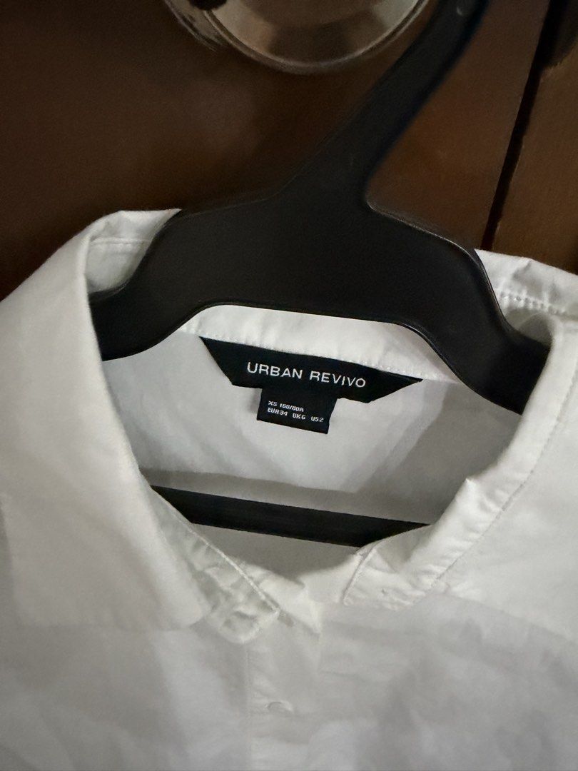 Urban revivo white polo (Category: Blouses) located in Quezon City. Submitted by prettyme23 (Listing ID 1470938308, Image 2). Description: size is xs small but fit up to small its like oversized polo no issue .