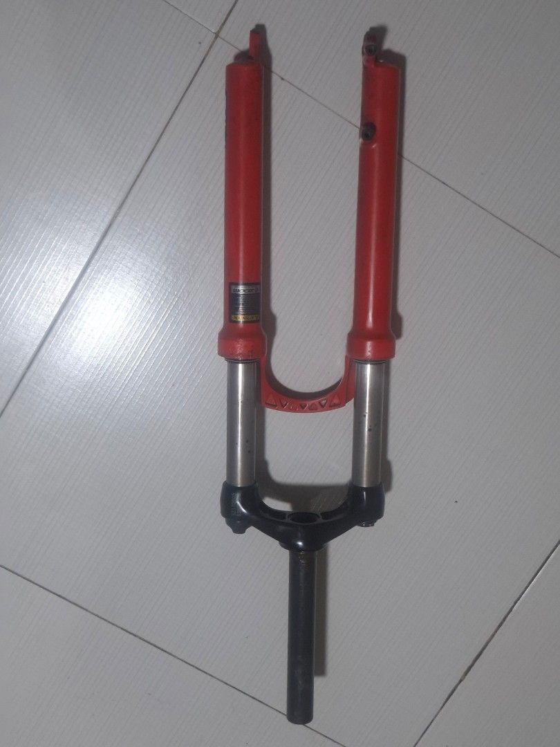 Vaxa Suspension Fork Red Mountain Bike (Category: Bicycles) located in Quezon City. Submitted by sgtshae (Listing ID 1471030271, Image 2). Description: - Brand:Vaxa with RockShox stickers - Color: Red lowers, black steerer tube and crown - Condition: Normal cosmetic scuffs and wear from trail riding - Performance: Clean stanchions, fully functional What you see is what you get. - Perfect for: Bike builds or repair projects.