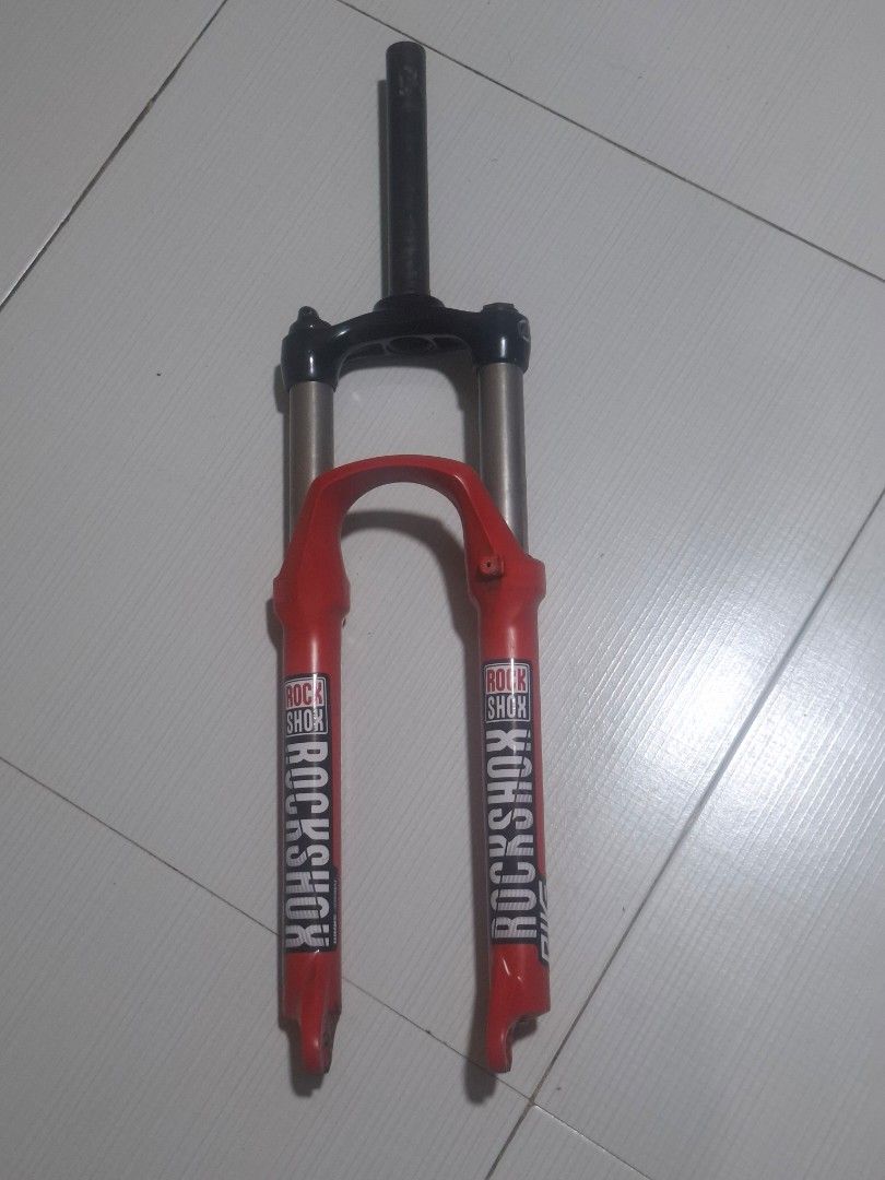 Vaxa Suspension Fork Red Mountain Bike (Category: Bicycles) located in Quezon City. Submitted by sgtshae (Listing ID 1471030271, Image 1). Description: - Brand:Vaxa with RockShox stickers - Color: Red lowers, black steerer tube and crown - Condition: Normal cosmetic scuffs and wear from trail riding - Performance: Clean stanchions, fully functional What you see is what you get. - Perfect for: Bike builds or repair projects.
