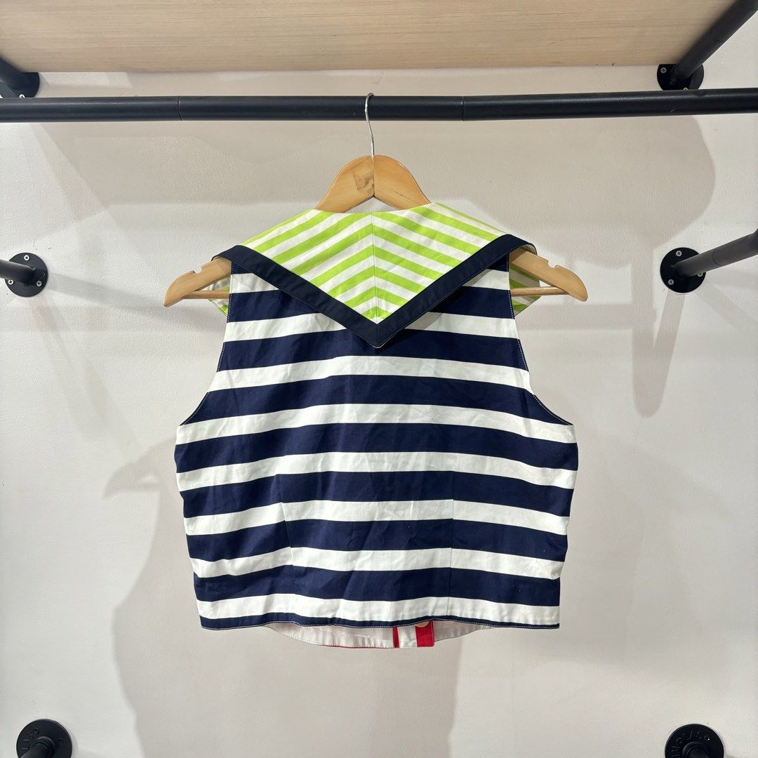 Versace Jeans Couture Multicolour Striped Sailor Vest (Category: Blouses) located in Bambang. Submitted by heats777 (Listing ID 1471038428, Image 3). Description: - Brand: Versace Jeans Couture - Size: M - Design: Bold multicolour with red/white diagonal stripes on front, navy/white horizontal stripes on back, and neon green/navy collar - Details: Double-breasted front with gold-tone branded buttons - Material: 100% cotton outer, 100% rayon linin