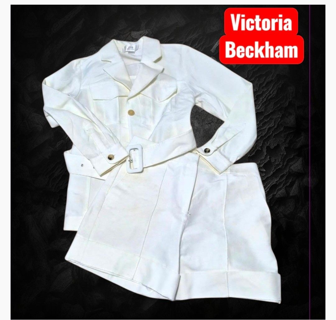 Victoria Beckham VVB White Jacket and Shorts Set (Category: Sets or Coordinates) located in Paranaque City. Submitted by calm_youngstore7 (Listing ID 1471019639, Image 3). Description: - Brand: Victoria Beckham VVB - Item: Matching white jacket and shorts set - Jacket details: Long sleeves, button-up, lapel collar, chest flap pockets, and included buckle belt - Shorts details: Tailored fit, front pleats, and cuffed hems - Style: Crisp, monochroma