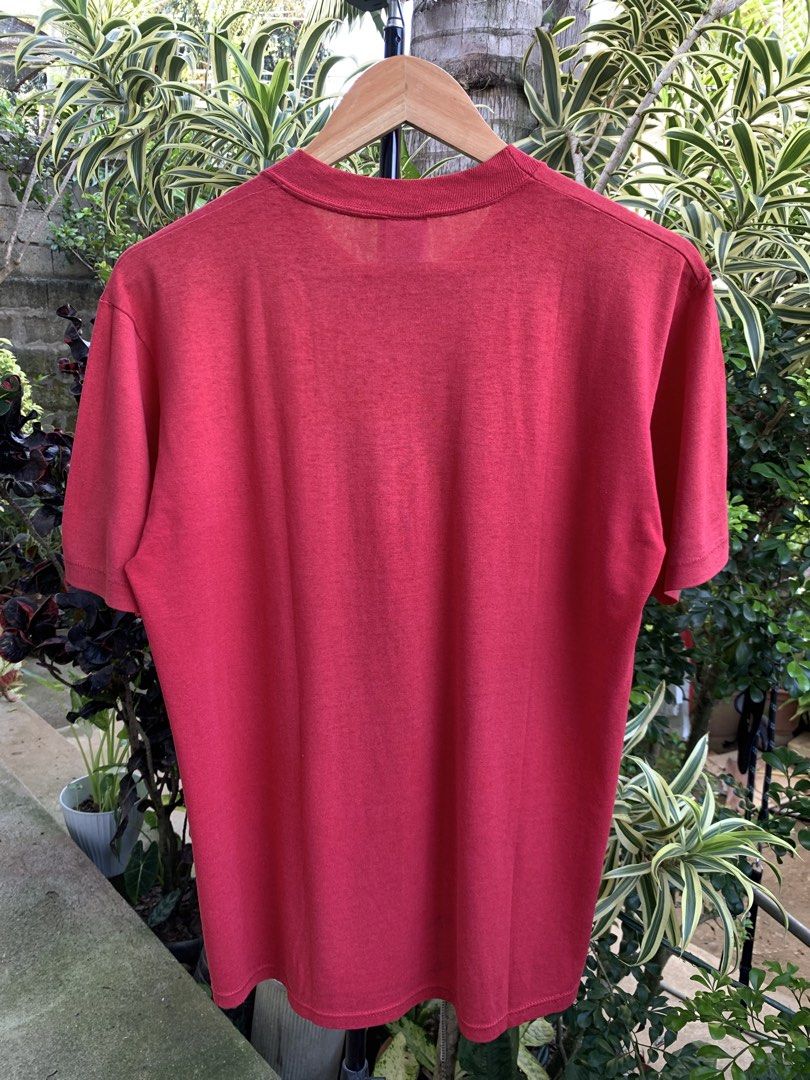 Vintage 1980s Jerzees blank tee (Category: Tshirts & Polo Shirts ) located in Cagayan de Oro. Submitted by premium_thrifts (Listing ID 1471030096, Image 3). Description: Red colorway. Good condition. Single stitch on sleeves and double on hem Fits Large L26.8" x W21" 18" (shoulder to shoulder) 8.5" (sleeve length) Issue: has fades, bleach stain spots, small holes on both armpit, and lints Add shipping fee (via JRS or J&T).