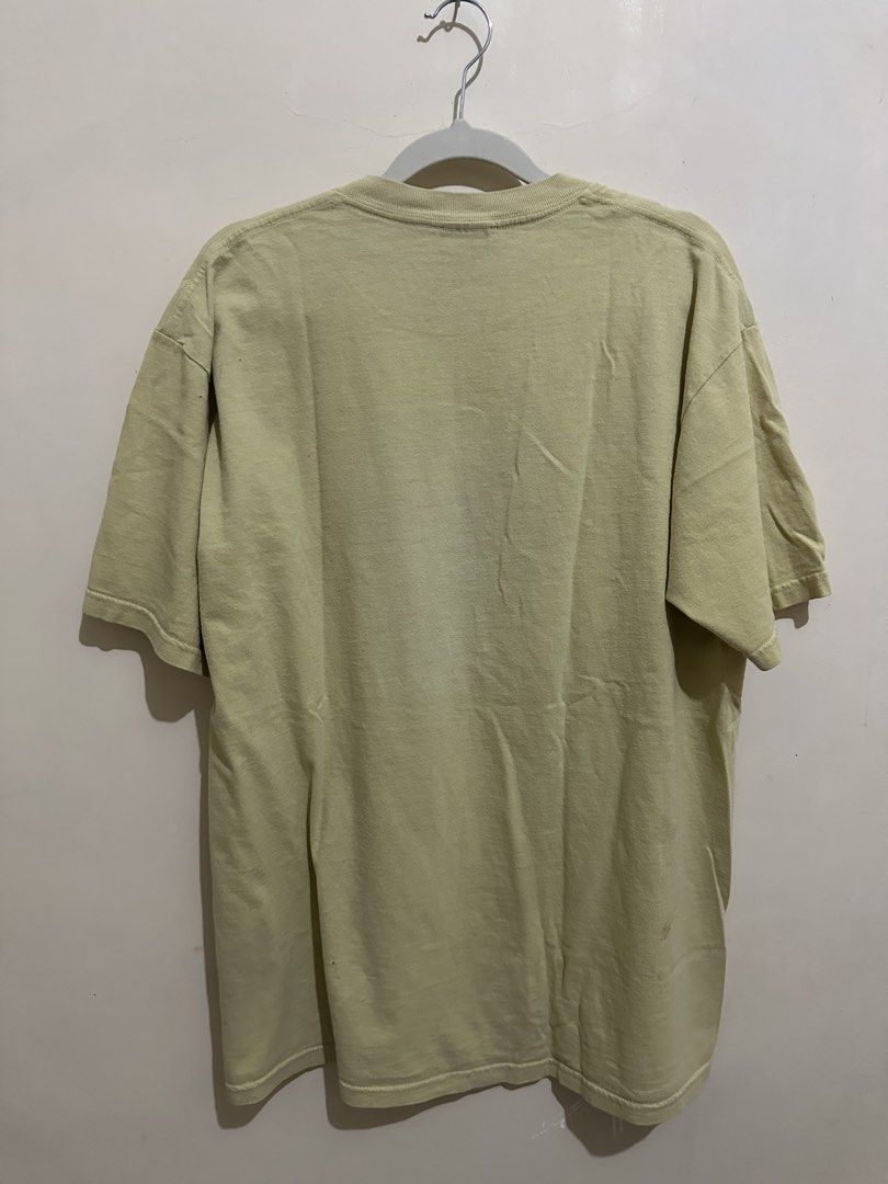 Vintage 2003 Supreme Popcorn Tee (Category: Tshirts & Polo Shirts ) located in Tagum. Submitted by ritarits572 (Listing ID 1471075958, Image 2). Description: - Brand: Supreme - Item: Vintage 2003 Popcorn Graphic Tee ('With Butter 25¢') - Size: L (Made in U.S.A.) 22 x 28.6 - Material: 100% Pre-shrunk cotton - Color: Pale yellow / sage - Condition: 7/10 (vintage wear, slight graphic cracking/fade adding authentic vintage vibe) - Perfect for streetw