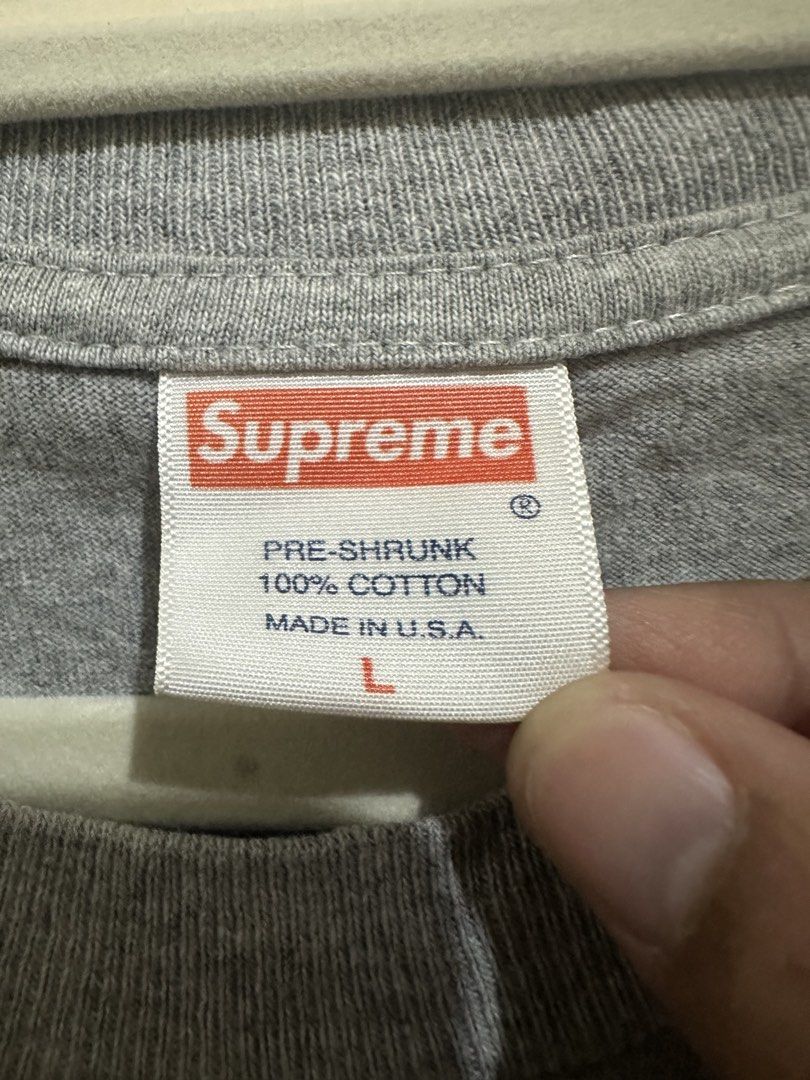 Vintage 2008 Supreme Predator Box Logo Tee (Category: Tshirts & Polo Shirts ) located in Tagum. Submitted by ritarits572 (Listing ID 1471076631, Image 3). Description: - Brand: Supreme - Color: Grey - Size: Large 21 x 19 - Material: 100% Pre-shrunk Cotton (Made in U.S.A.) - Design: Front split white/black Supreme logo; back red "Fuck All Y'all" text - Fit: Standard fit, short sleeves, crew neck - Condition: Ready to wear with clean interior tags 