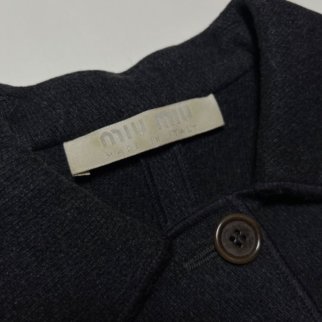 Vintage 90s Miu Miu Dark Gray Wool Jacket (Category: Luxury Apparel) located in Caloocan City. Submitted by achilles_grails (Listing ID 1471055699, Image 3). Description: - Brand: Miu Miu (Vintage 90s) - Color: Dark Gray - Material: Premium Wool (Made in Italy) - Size: IT 40 - Features: Classic collar, front button closure, front pockets - Condition: Excellent pre-loved vintage condition.